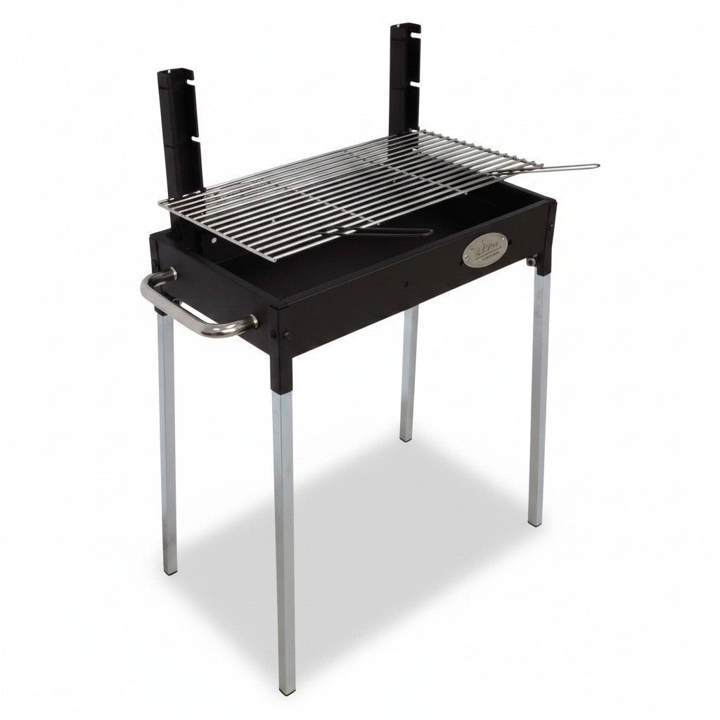 Asia Trade portable Brazilian charcoal grill with a black steel body, chrome grid, and sturdy legs for outdoor cooking.