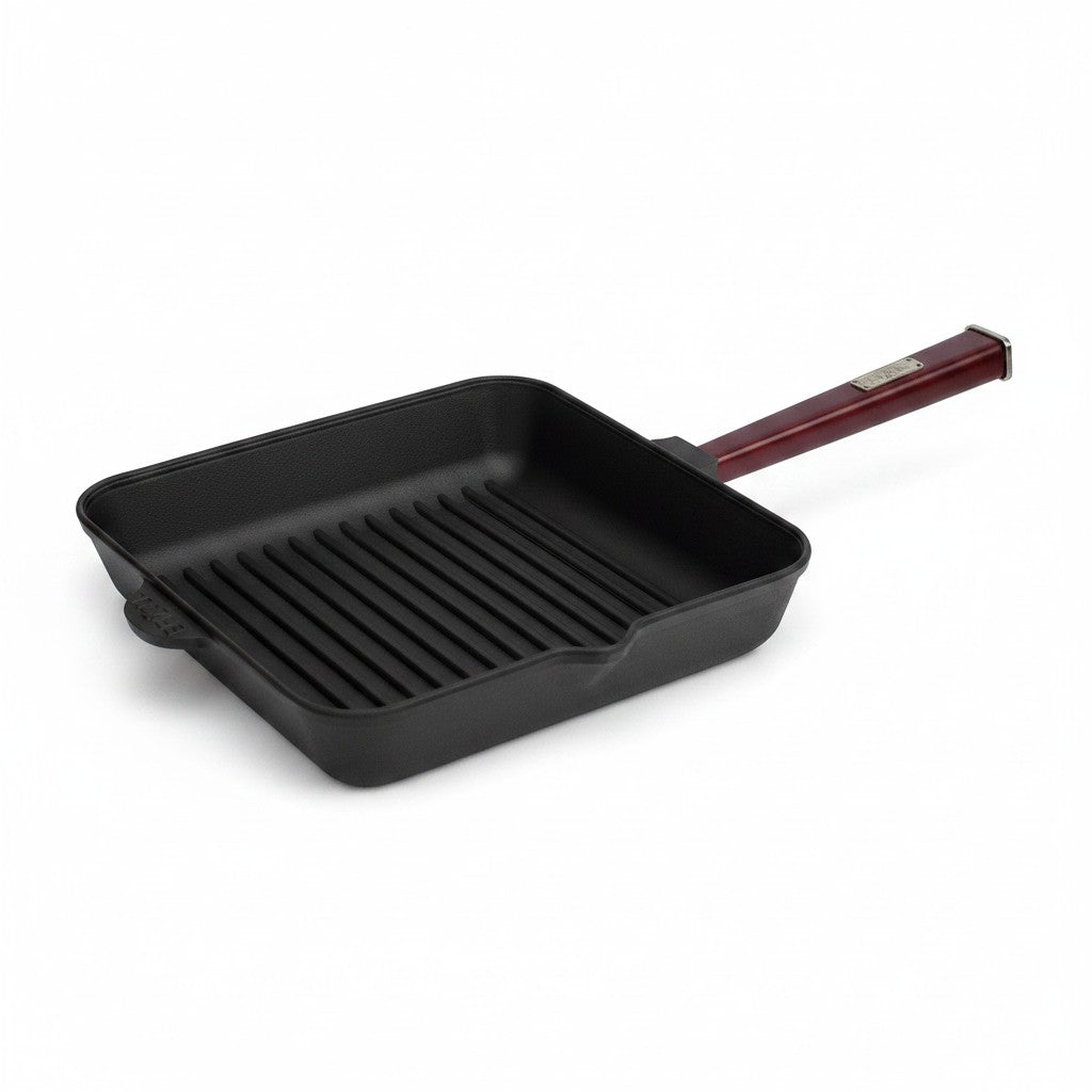 Asia Trade BRIZZOL square cast iron grill pan with a wooden handle, suitable for induction and open fire cooking.