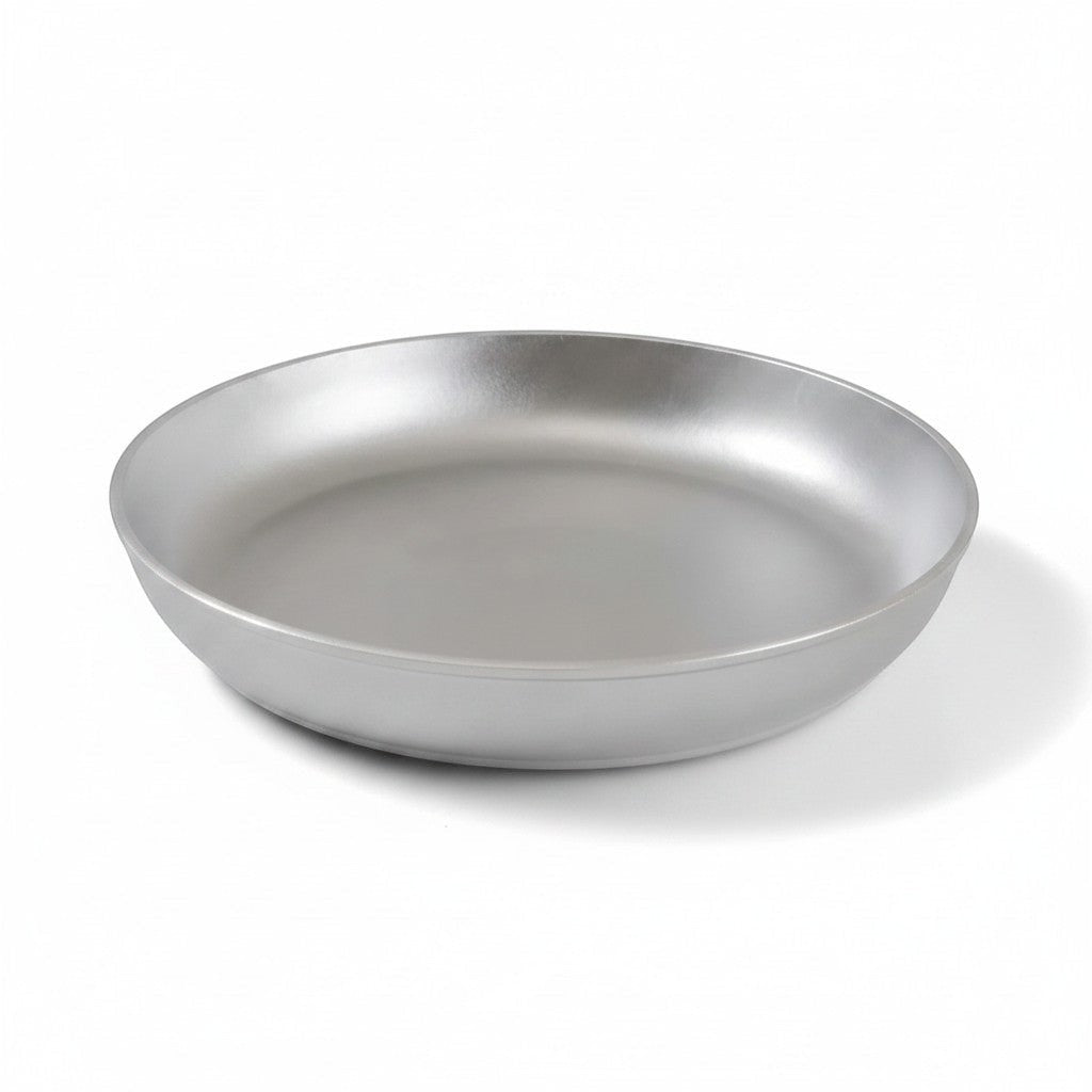 Asia Trade 34cm round cast aluminum frying pan with a smooth silver finish on a white background