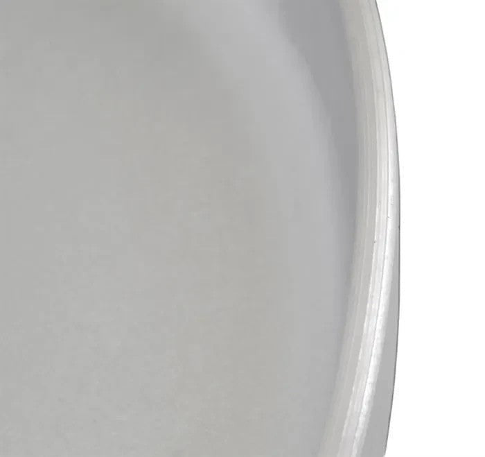 Asia Trade 34cm cast aluminum frying pan with a smooth metallic silver finish and curved edge