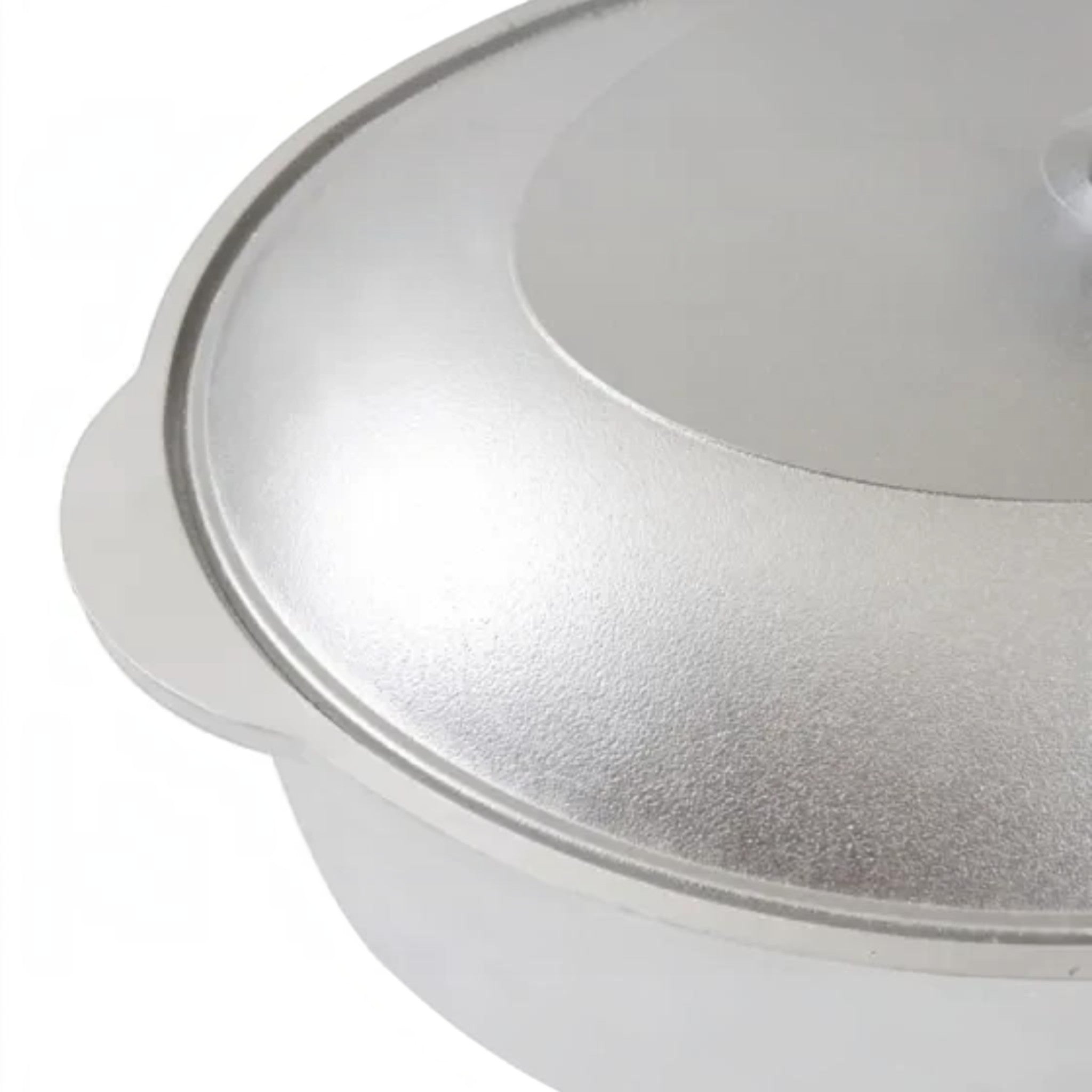 Asia Trade 5.5 liter cast aluminum roaster pot with lid, featuring a durable metallic silver finish.