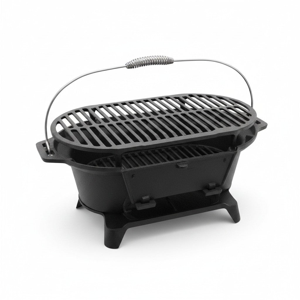 Asia Trade cast iron hibachi tabletop grill with a metal carrying handle and adjustable air vent on white background