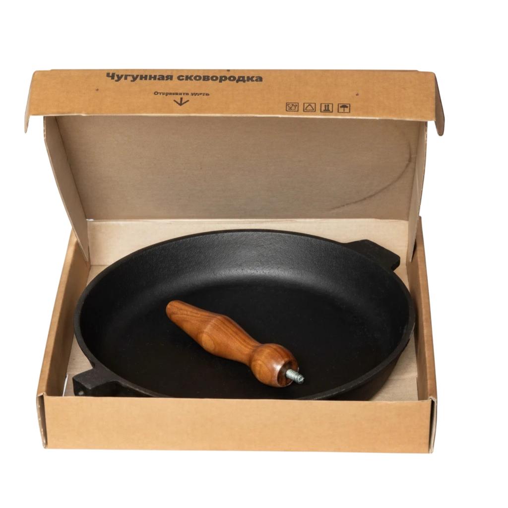 Asia Trade 28cm cast iron skillet with a detachable wooden handle, presented in its original cardboard packaging.