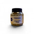Asia Trade chamomile herbal tea in a clear plastic jar with a black lid and floral label