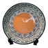 Asia Trade 32cm decorative ceramic plate with intricate floral patterns in blue, green, and red on a terracotta base.