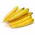 A bunch of fresh yellow carrots from Asia Trade, featuring vibrant skin and green tops on a white background.