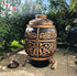 Asia Trade 100L insulated clay tandoor oven in black with ornate gold carved patterns, standing on decorative metal legs.