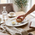 Asia Trade Goldie Collection 36cm oval white porcelain serving platter with delicate gold rim on a wooden table
