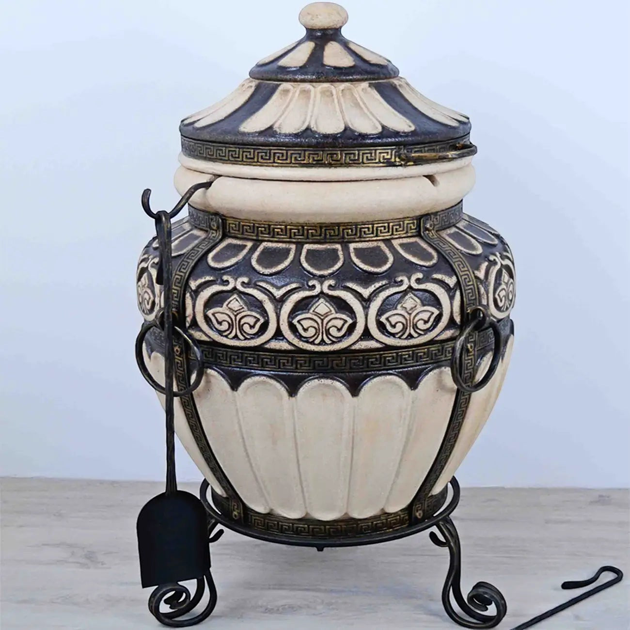 Asia Trade Greece 100L clay tandoor oven with intricate black and cream decorative patterns on a metal stand