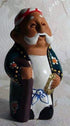 Asia Trade handcrafted clay figurine of an elderly man in traditional Uzbek attire, 11cm tall.