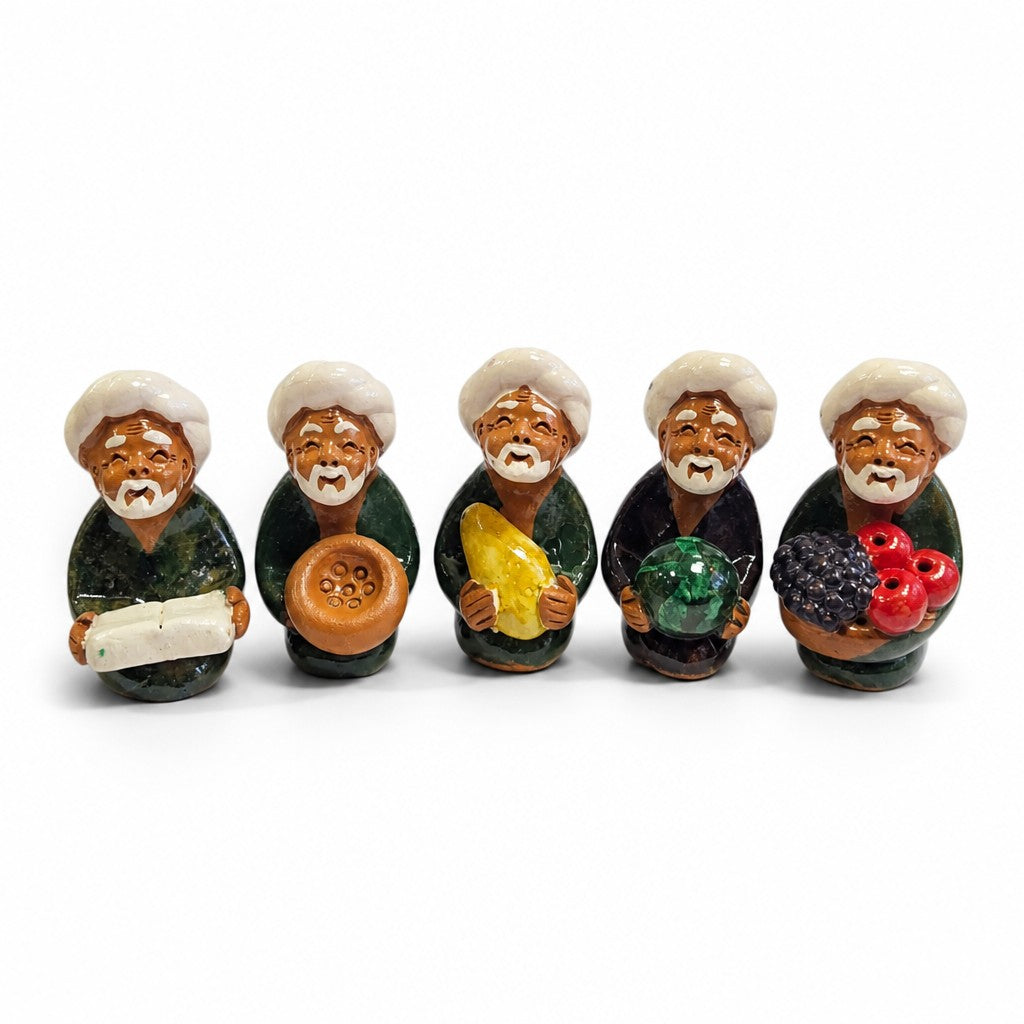 Asia Trade set of five handcrafted Uzbek ceramic figurines depicting men with white turbans holding various goods