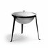 Asia Trade 15-liter cast aluminum kazan pot with lid set on a black metal tripod stand for outdoor cooking