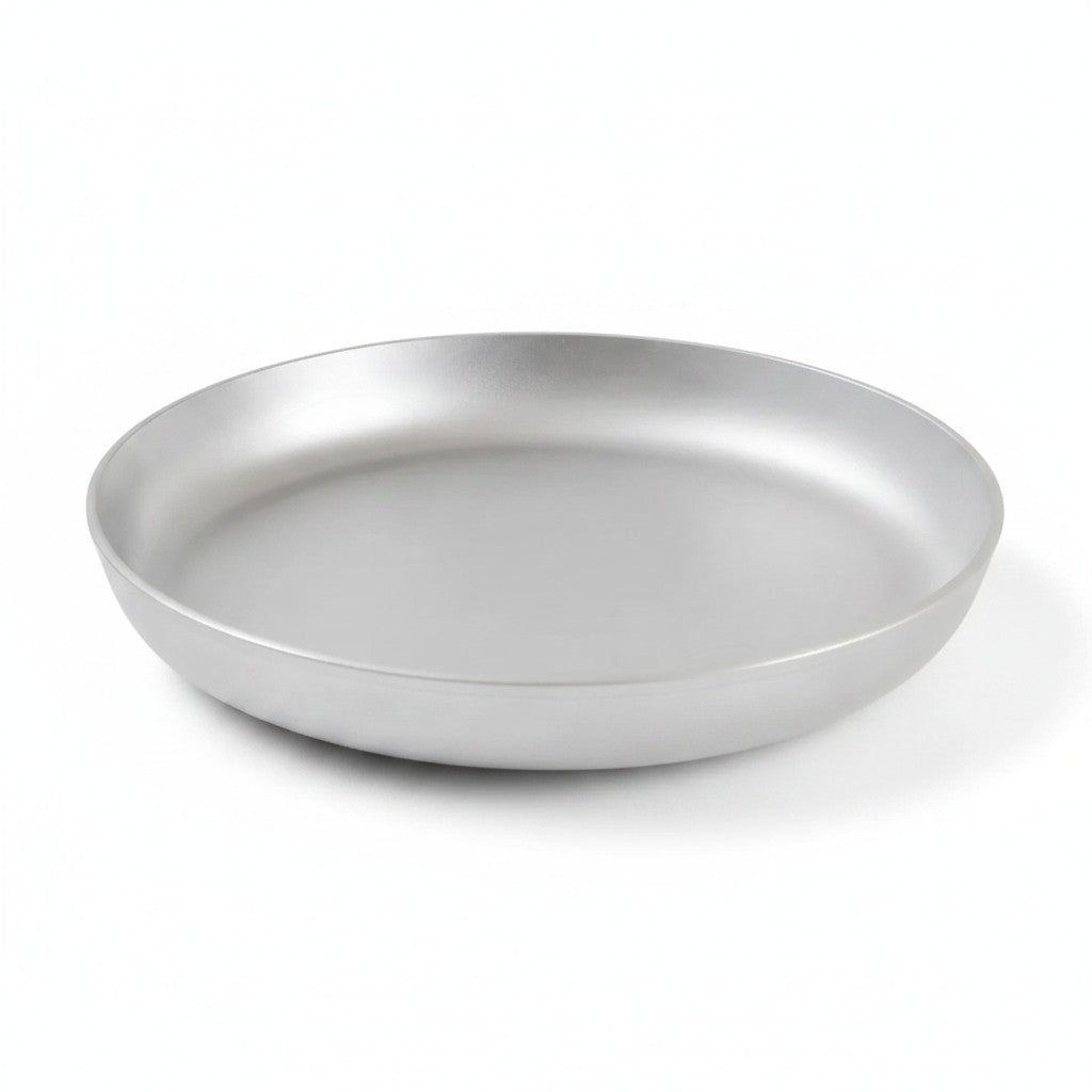 Asia Trade Kukmara 18cm uncoated cast aluminum frying pan with a natural silver finish for even heat distribution.