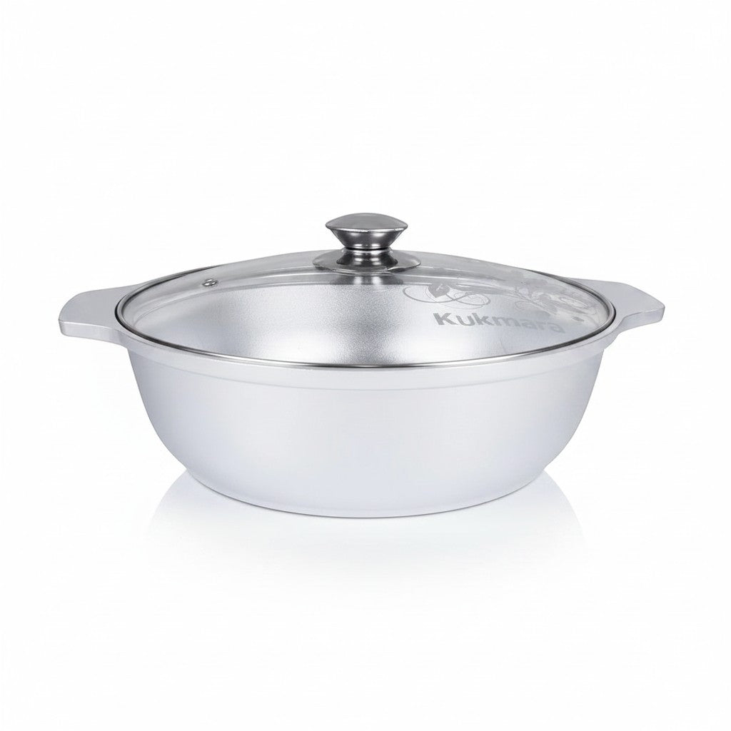 Asia Trade Kukmara 3-liter cast aluminum saute pan with glass lid, featuring a durable design for even heat cooking.