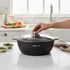 Asia Trade Kukmara 4L marble induction roaster pot with glass lid on a kitchen counter