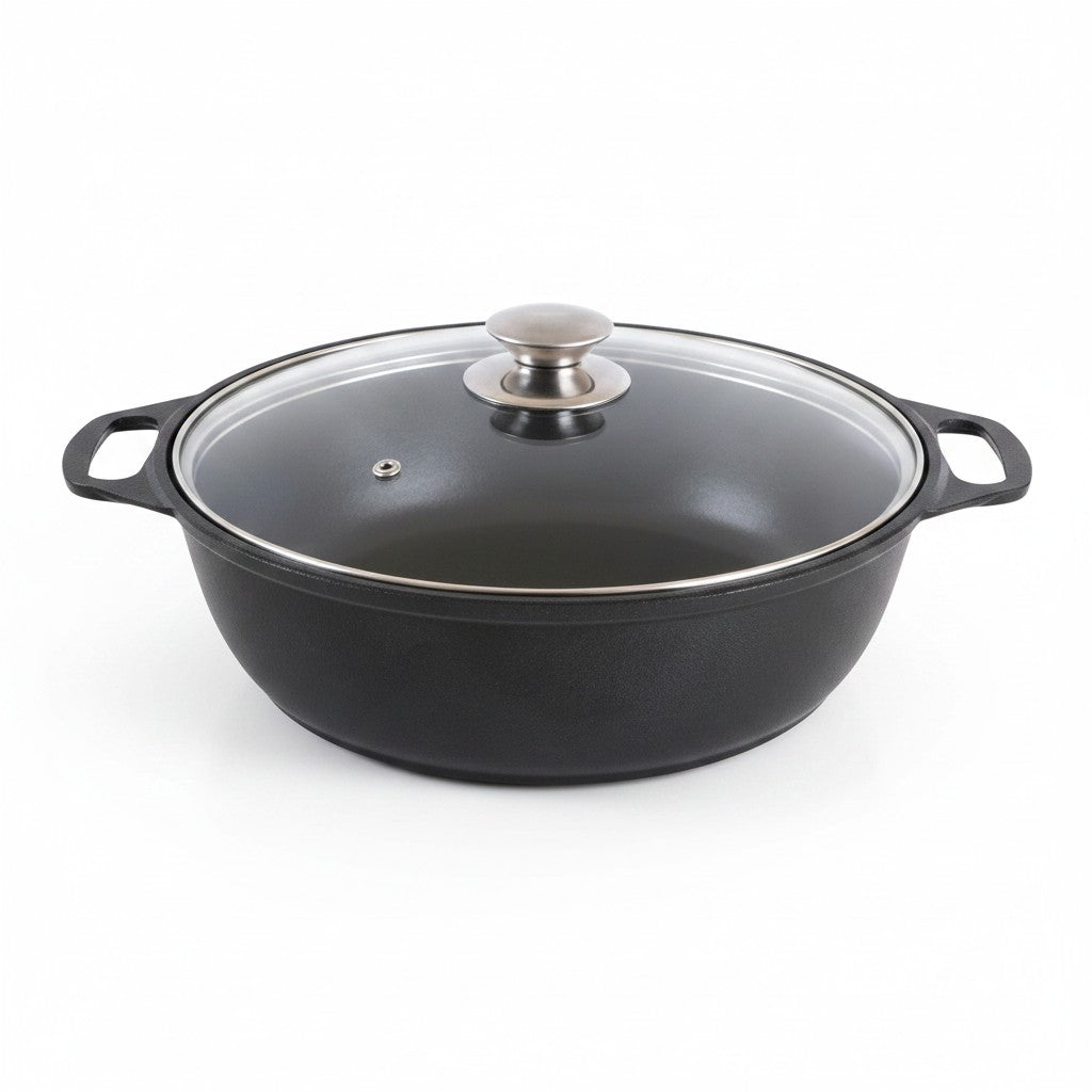 Asia Trade Kukmara 4-liter non-stick cast aluminum saute pan with glass lid, 26cm diameter, black finish.