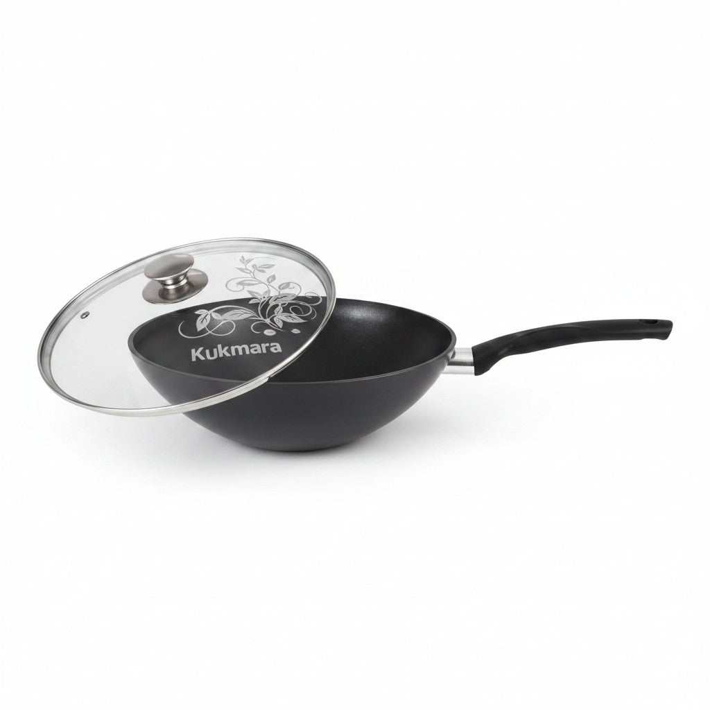Asia Trade Kukmara 28cm non-stick wok pan with glass lid, featuring durable cast aluminum and ergonomic handle.