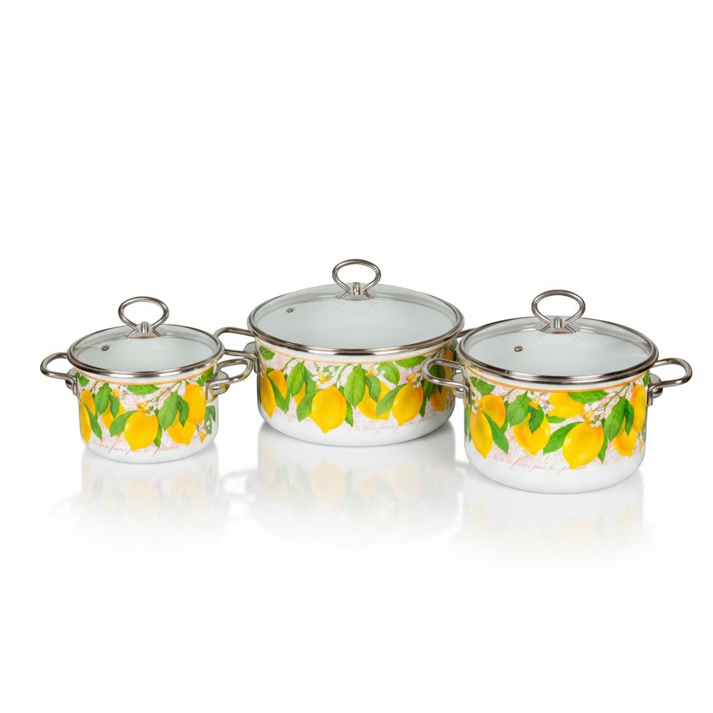 Asia Trade set of three white enamel pots with yellow lemon print and glass lids in various sizes