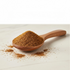 Asia Trade Manti spice blend with coriander, paprika, black pepper, and cumin in a wooden spoon