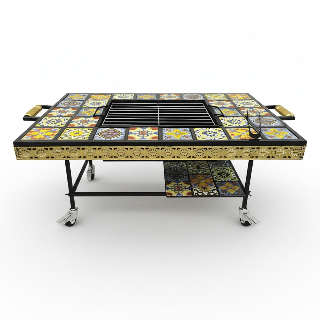 Asia Trade mosaic tile outdoor grill table with metal frame, wooden handles, and wheels on a white background