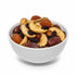 Asia Trade natural dried fruit mix including apricots, apple slices, and dates in a white bowl