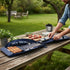 Asia Trade premium 41-piece outdoor barbecue set in a blue carry case with stainless steel skewers on a wooden table.