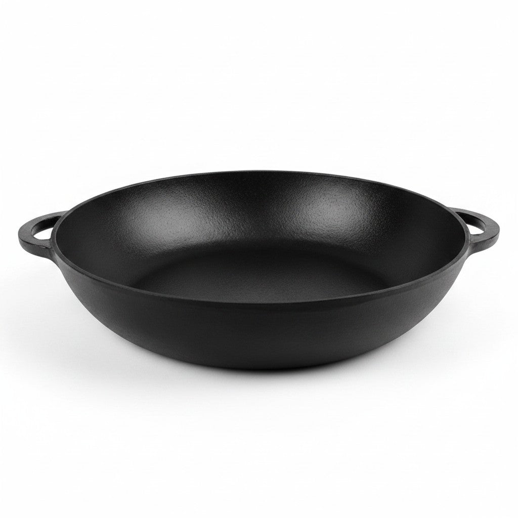 Asia Trade SITON 34cm black enameled cast iron saute pan with two side handles on a white background