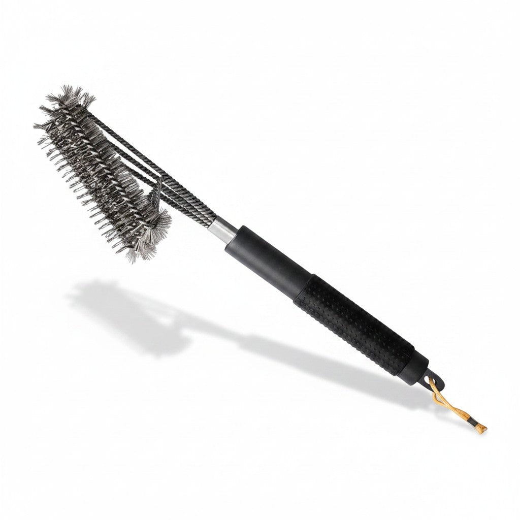 Asia Trade grill cleaning brush with a three-sided stainless steel wire head and a comfortable black handle.