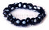 Asia Trade authentic Uzbek traditional bracelet made of black glass beads with white circular patterns