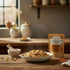 Asia Trade Uzbek Plov spice blend packet next to a steaming bowl of traditional rice pilaf on a rustic wooden table.