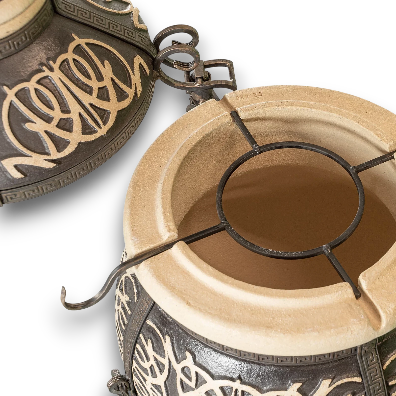 Asia Trade Zafir 110L clay tandoor oven with ornate dark exterior and metal skewer rack insert